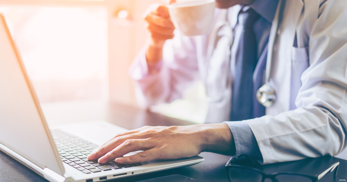 Doctor browsing the web